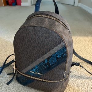 Michael Kors Rhea backpack - brown MK logo with blue snakeskin